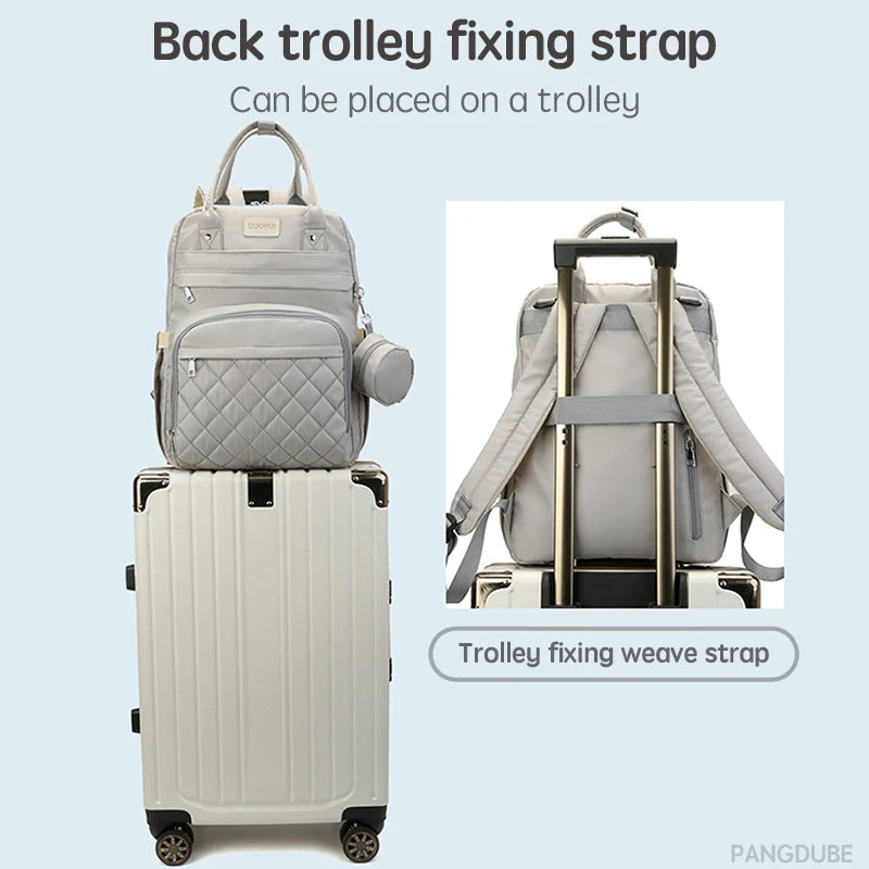 Diaper Backpack with Changing Pad & Stroller Hooks - Nappy Bag - MamaNest