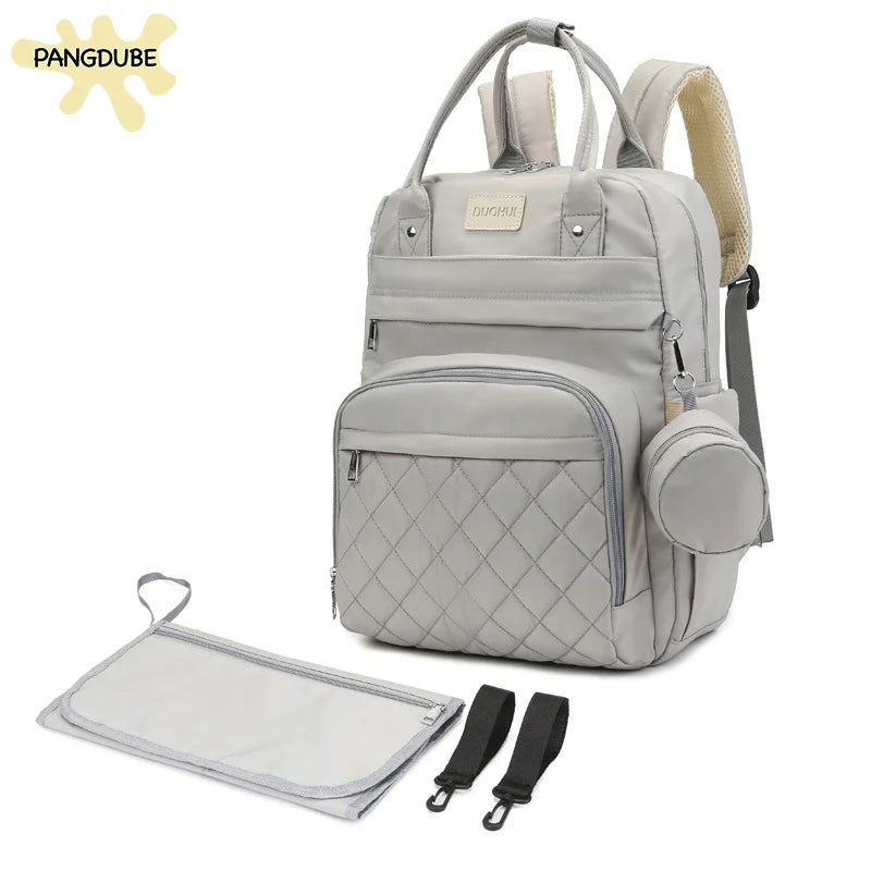 Diaper Backpack with Changing Pad & Stroller Hooks - Nappy Bag - MamaNest