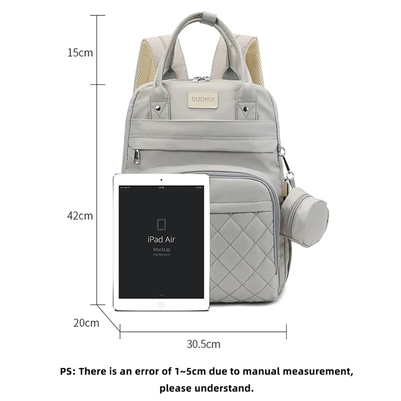 Diaper Backpack with Changing Pad & Stroller Hooks - Nappy Bag - MamaNest